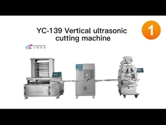 機械によって詰められるクッキーの生産設備を作る100gクッキーのビスケット